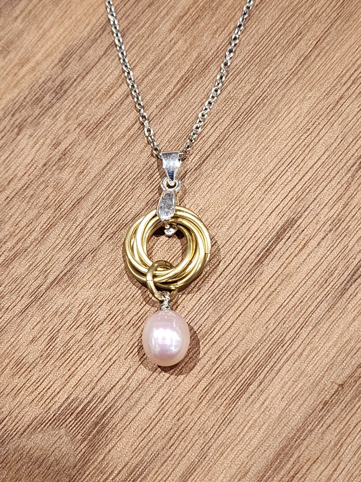 Golden Love Knot Necklace with Freshwater Pearl – A Timeless Symbol of Love and Grace