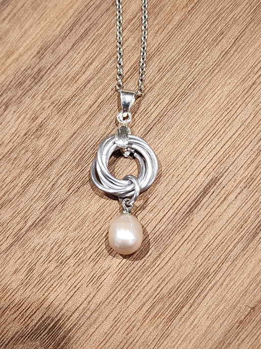 Silver Love Knot Necklace with Freshwater Pearl – A Timeless Symbol of Love and Grace