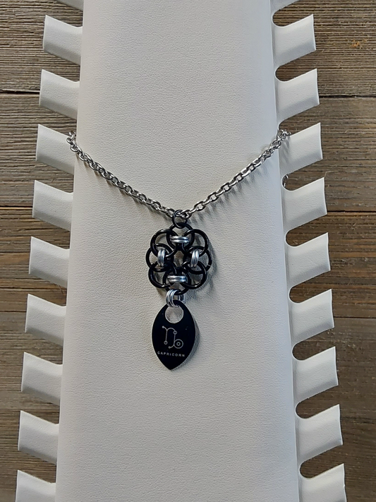Helm Flower Onyx (Black) and Platinum (Silver) Zodiac Scale Pendant - Capricorn