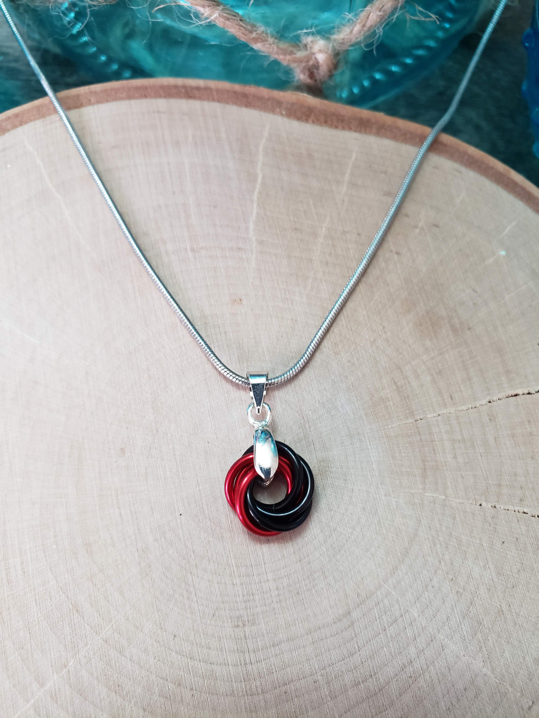 Candy Apple and Onyx Chainmaille Small Love Knot Necklace