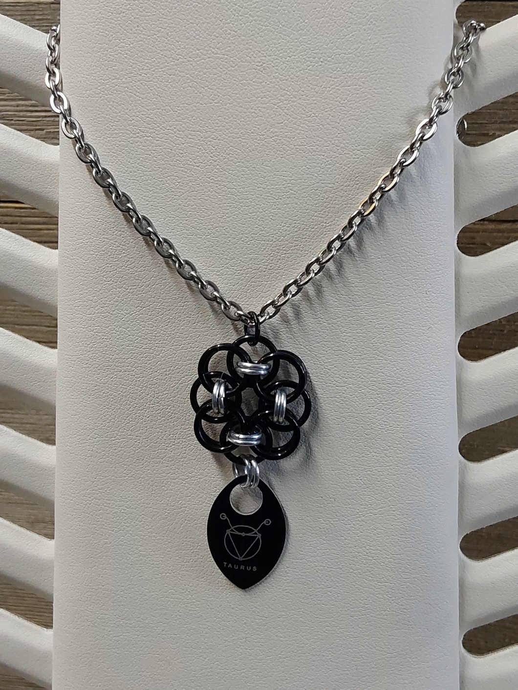 Helm Flower Onyx (Black) and Platinum (Silver) Zodiac Scale Pendant - Taurus